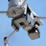 uav payload drop system close up dual hook mechanism